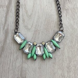 Rhinestone bib necklace with green accents